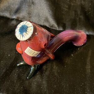 Artistic Glass Pipe - Red, green with a white and blue flower or eye.